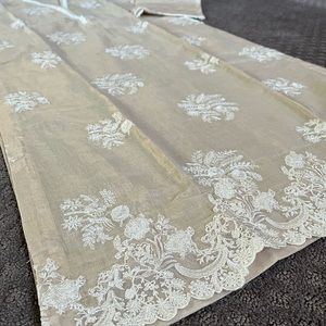 Medium size semi formal womens, cotton net kurta, with delicate silk embroidery